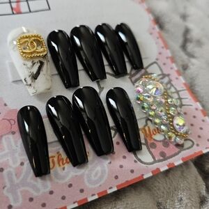 Black Coffin Shaped Press-On Nails with White and Gold Rhinestone Accents